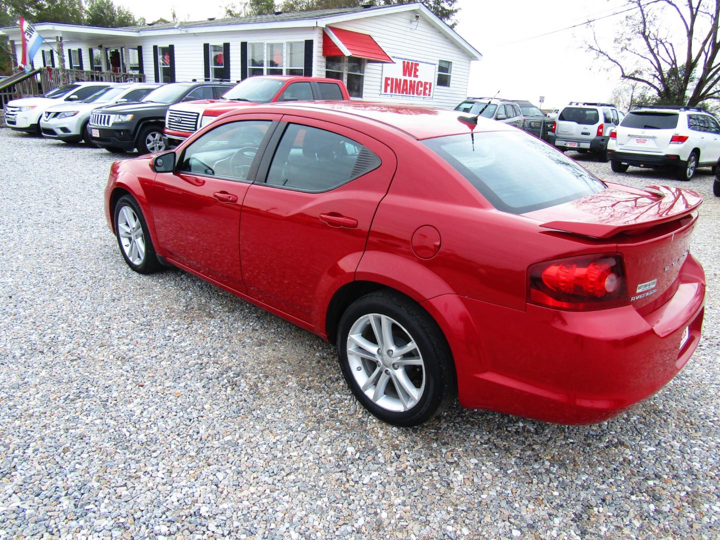 2012 Red Dodge Avenger SXT (1C3CDZEG1CN) with an 3.6L V6 DOHC 24V engine, Automatic transmission, located at 15016 S Hwy 231, Midland City, AL, 36350, (334) 983-3001, 31.306210, -85.495277 - Photo#4